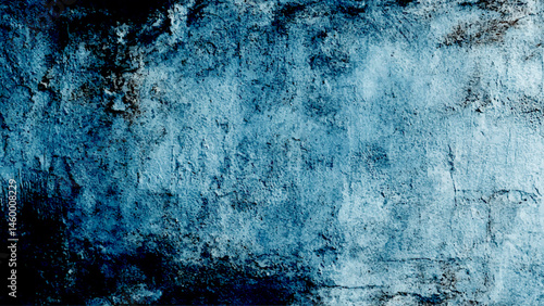 A close up of a grainy blue concrete studio wall. Blue textured plaster background with vignette effect for design projects Grungy abstract backdrop