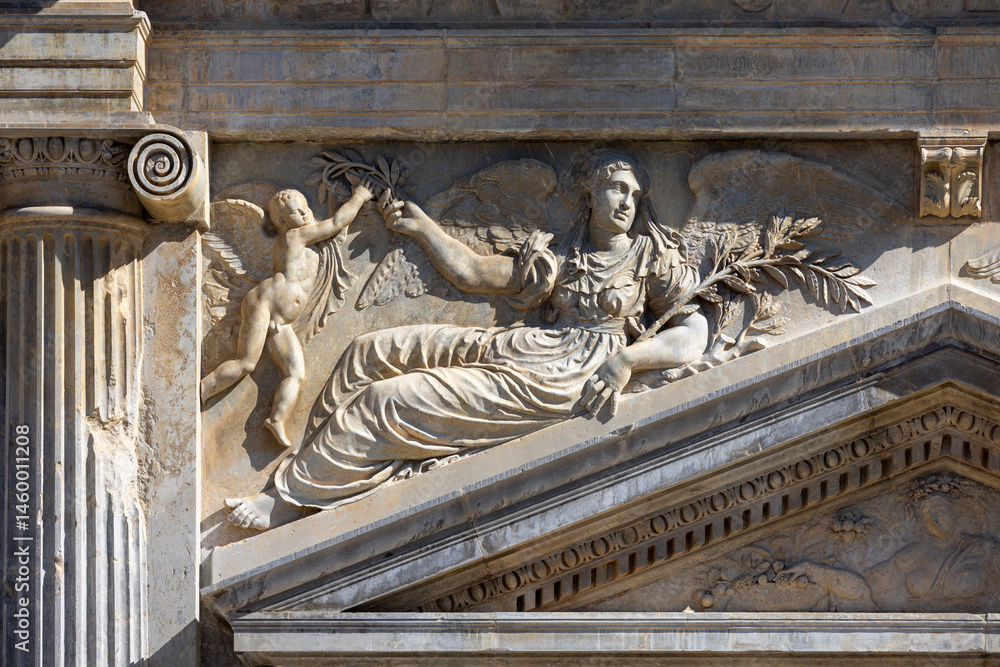 Relief on facade of Palace of Charles V, renaissance building inside fortress Alhambra, Granada, Spain, Andalusia