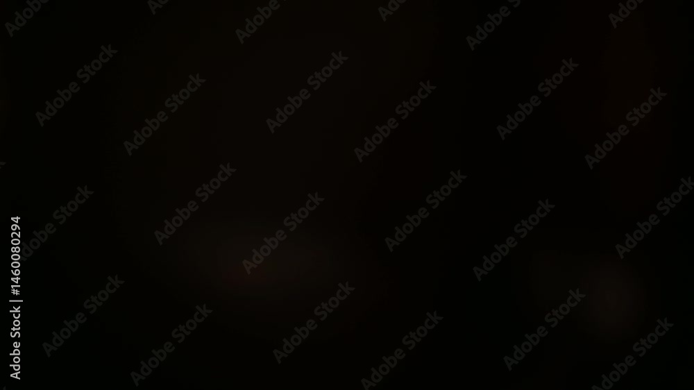 abstract light leaks iridescent cinematic bokeh on dark background in loop overlay video dreamy flare effect abstract light leaks iridescent cinematic bokeh on dark background in loop overlay video dreamy flare effect