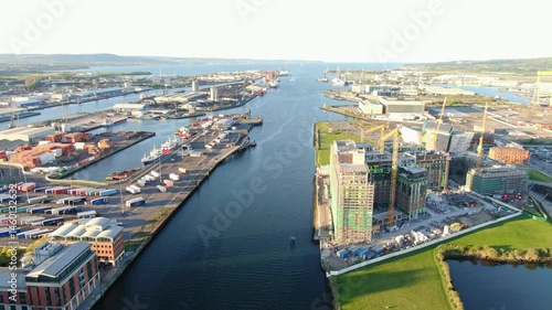Aerial view on Lagan river and buildings in City centre of Belfast Northern Ireland. Drone photo, high angle view of town