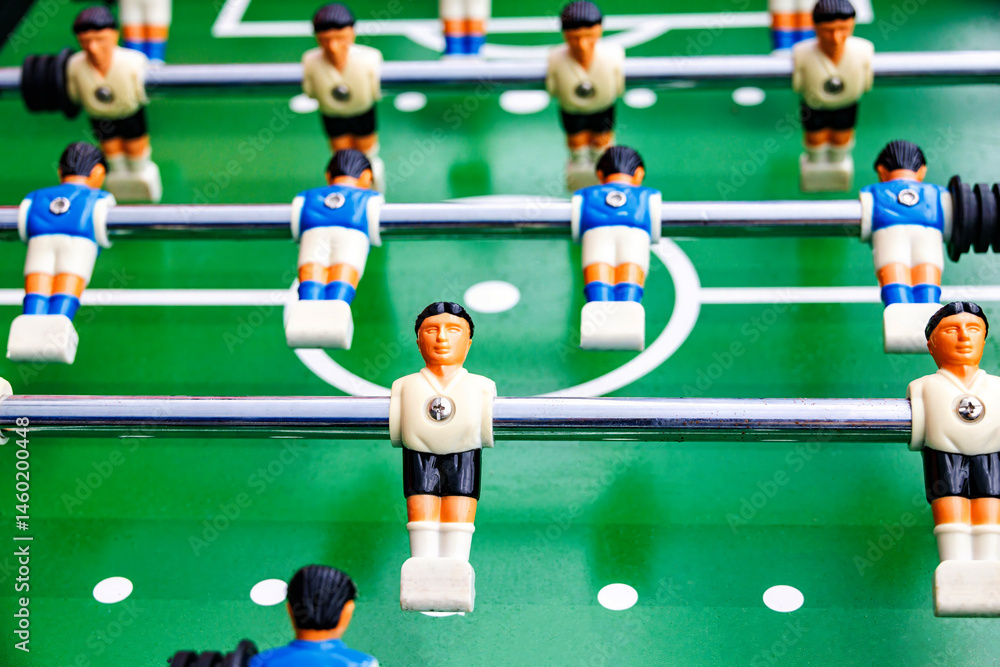 Colorful soccer table with players in action Colorful soccer table with players in action