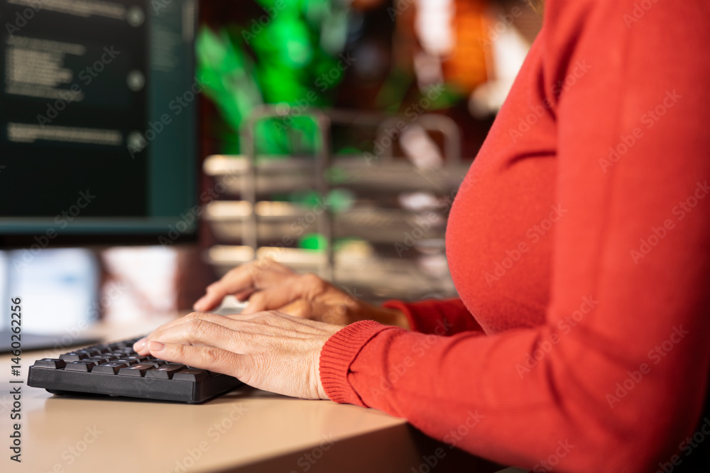 Professional person engaging with an AI chatbot on a computer screen, exploring the power of digital assistance through artificial intelligence. Employ smart solutions for efficient assistance.