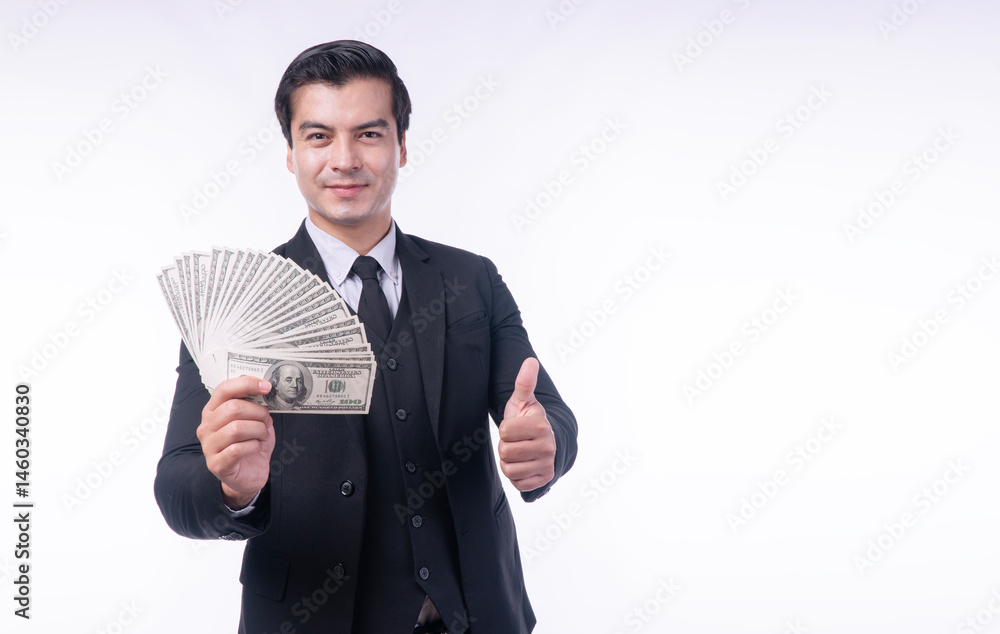 Success happy businessman holding dollar bills thumbs up copy space over isolated white background. Handsome guy showing banknote cash jackpot rich empty. Business finance successful concept. Success happy businessman holding dollar bills thumbs up copy space over isolated white background. Handsome guy showing banknote cash jackpot rich empty. Business finance successful concept.