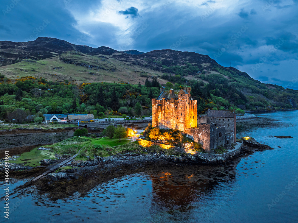 Night over Eilean Donan Castle and Loch Duich from a drone, Isle of Skye, Highlands, Scotland, England