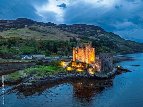 Night over Eilean Donan Castle and Loch Duich from a drone, Isle of Skye, Highlands, Scotland, England