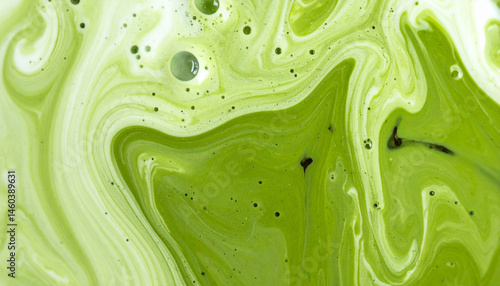 Green tea matcha mixing with milk texture background Food and drink close up