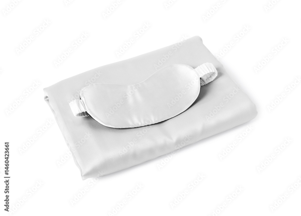 Silky bed linens and sleeping mask on white background Silky bed linens and sleeping mask on white background