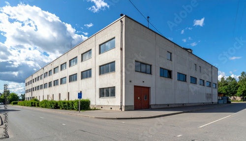 Modern Industrial Building with Clear Sky and Urban Landscape