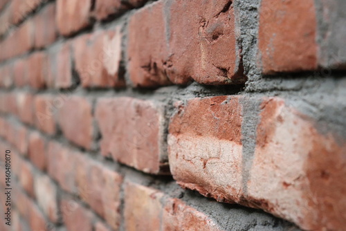 Obraz na płótnie Tiled Red Brick Wall with Mortar Filling in Angled CloseUp Detail View w salonie