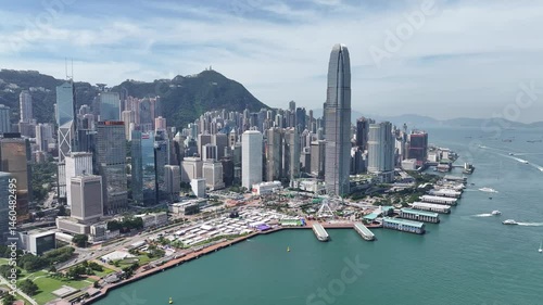 Hong Kong Central Harbourfront, surrounded by skyscrapers and major financial centers, offers stunning Victoria Harbour views. A key leisure and tourism landmark near Admiralty Wan Chai Tsim Sha Tsui 
