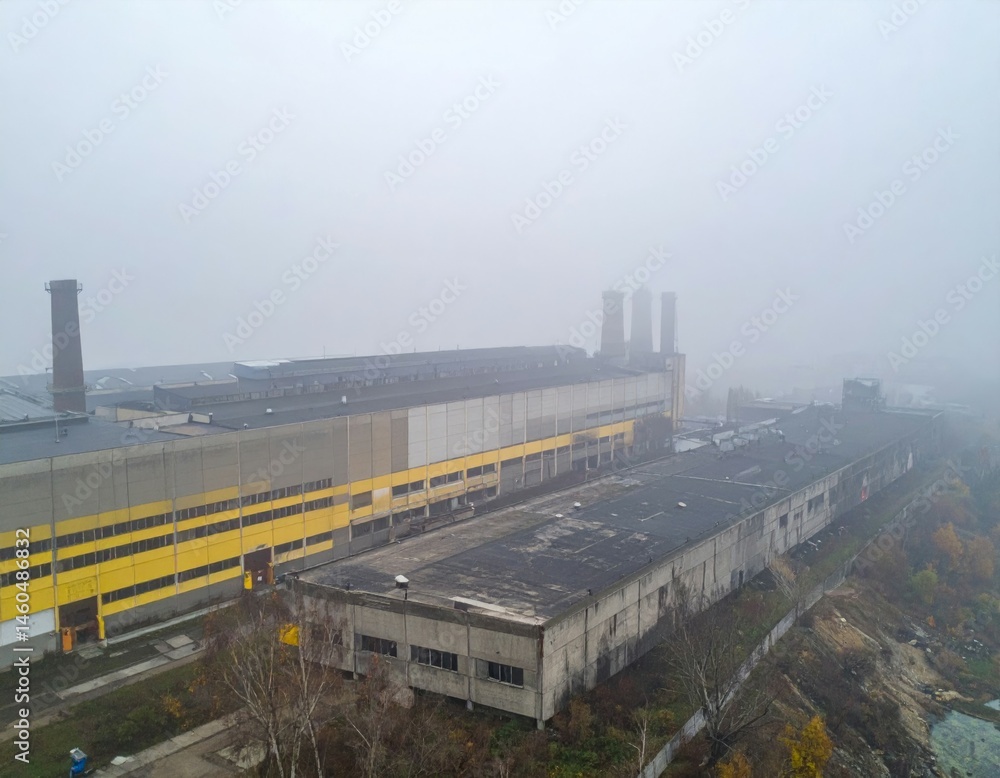 Fototapeta premium Industrial Complex amidst Thick Fog in Urban Environment