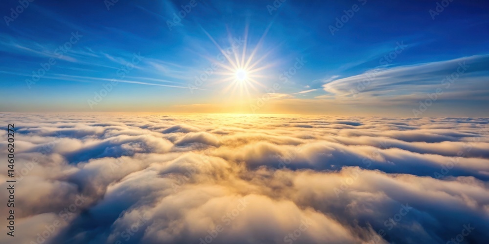 Obraz premium A breathtaking aerial view of a sunlit seascape of clouds, a majestic panorama of nature's artistry, showcasing the serene beauty of a vibrant sunrise above a boundless ocean of fluffy white clouds.