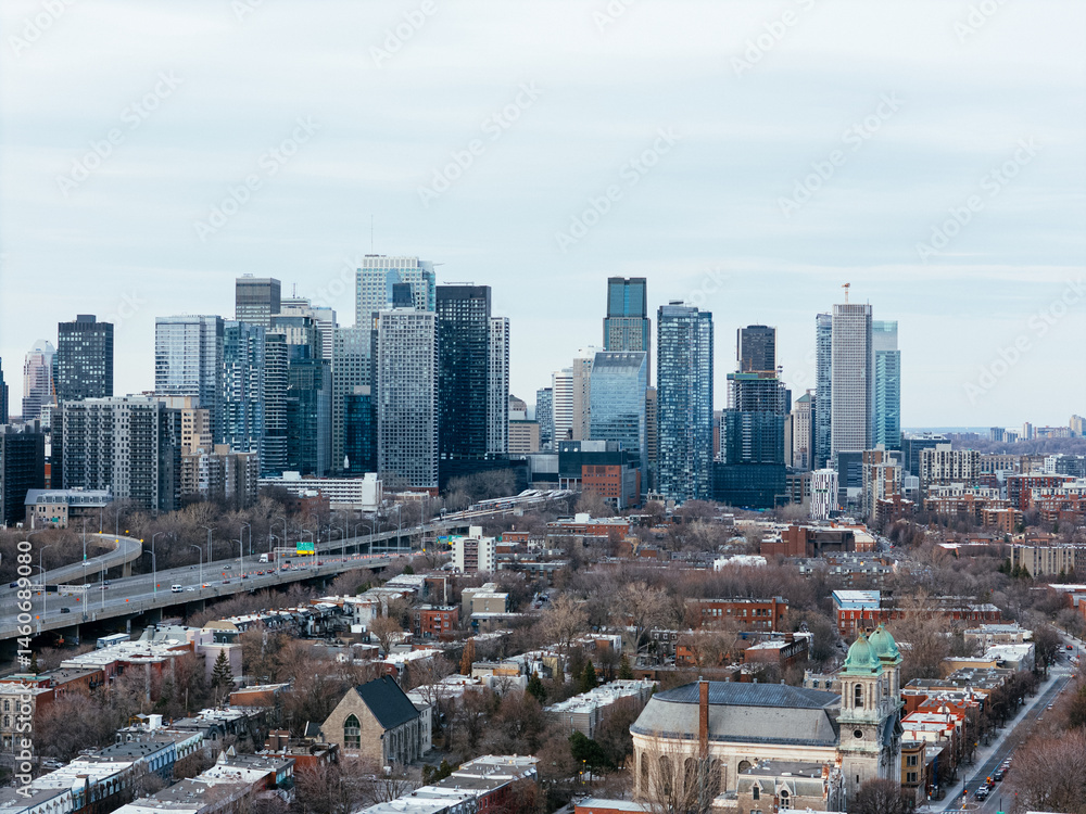 Fototapeta premium Montreal city downtown entrance. Skyline background of office, residential, and condo buildings