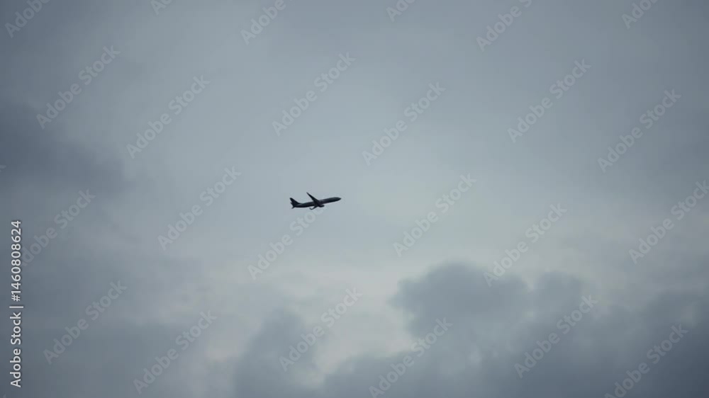 Plane Flying Through Cloudy Sky Low Angle View Plane Flying Through Cloudy Sky Low Angle View