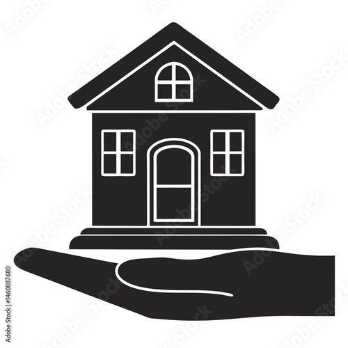Symbolic representation of a house held in hand illustrating real estate and home ownership