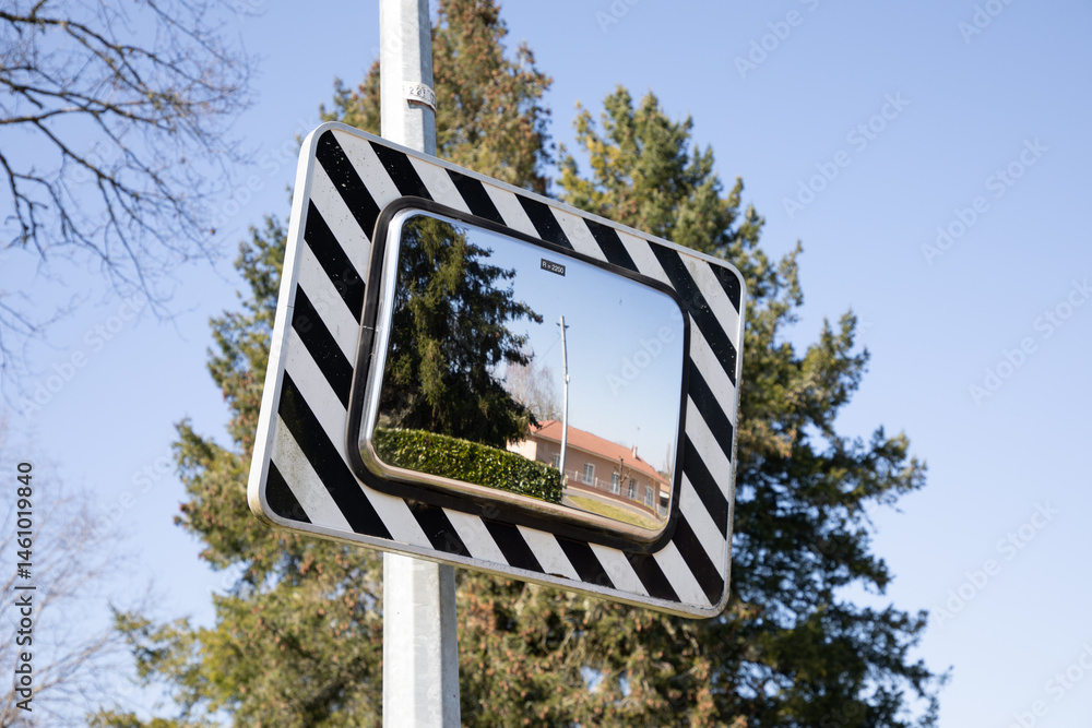 convex mirror rectangle for helping driver car street traffic vehicle in road on safety concept in city center