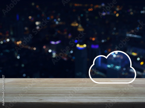  Cloud computing icon with copy space on wooden table over blur colorful night light modern city tower and skyscraper, Technology cloud computing concept