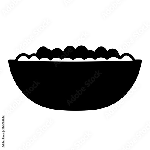 Silhouette of a bowl filled with fluffy spheres, possibly food or decorations