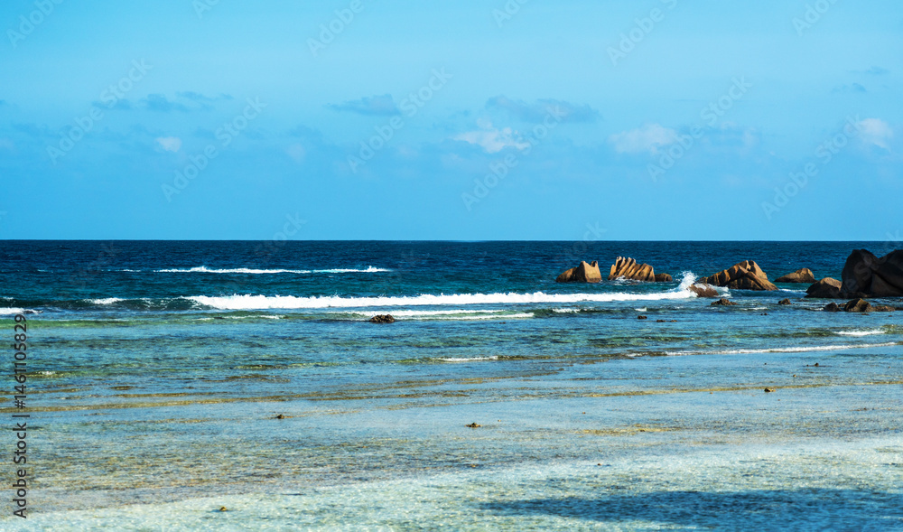 Anse Severe beach on La Digue island offers crystal clear waters, white sand