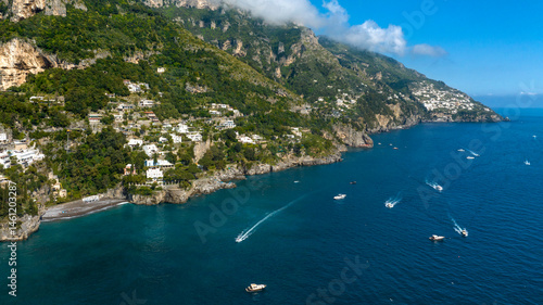 Obraz na płótnie Aerial view of the Amalfi Coast, in the province of Salerno, Campania, Italy. This coastal panorama is one of the most beautiful and touristic on the Italian peninsula. In background it's Praiano town w salonie