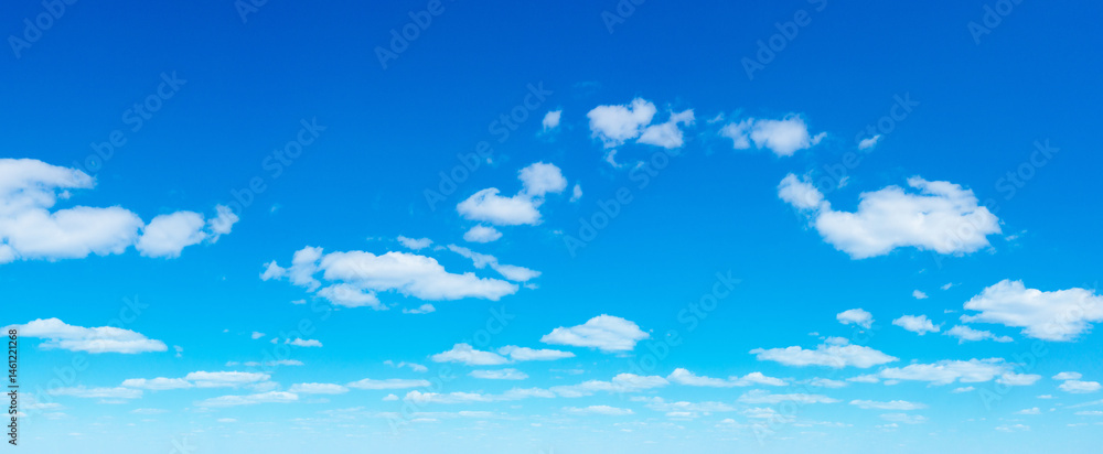 Blue Sky background with tiny Clouds. Panorama background