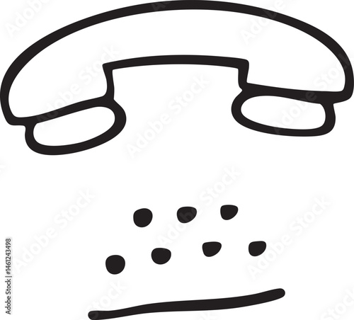 A black telephone handset rests on a white surface.