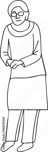 A woman with glasses stands upright looking slightly upwards.