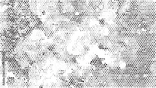 A dense of small overlapping white dots covers a black background.