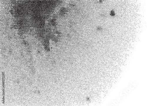 Dense black dots create a textured against a white background.