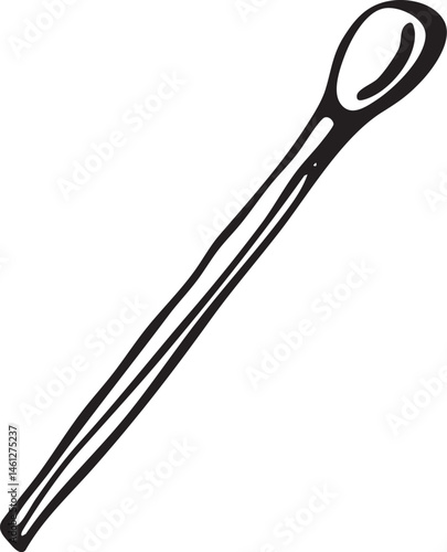 A simple black spoon rests vertically against a white background.