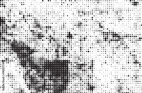 A grayscale portrait features a blurred human face composed of numerous small dots.