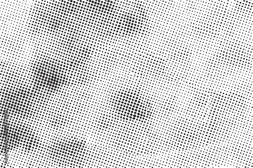 A close-up view of a face composed of numerous black and white dots.