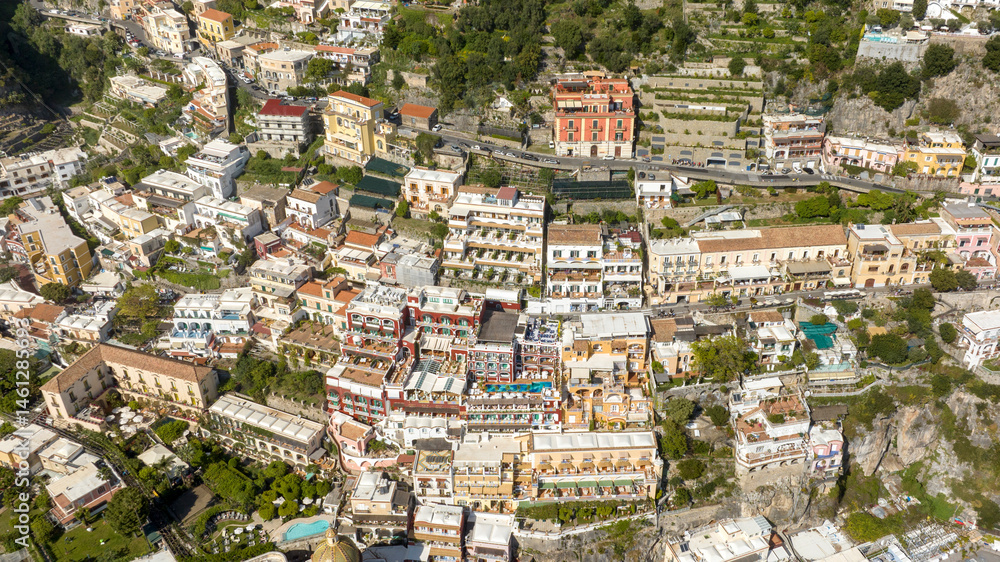 Aerial view of the characteristic colorful houses of Positano in the province of Salerno, Campania, Italy. They are built on a hill.