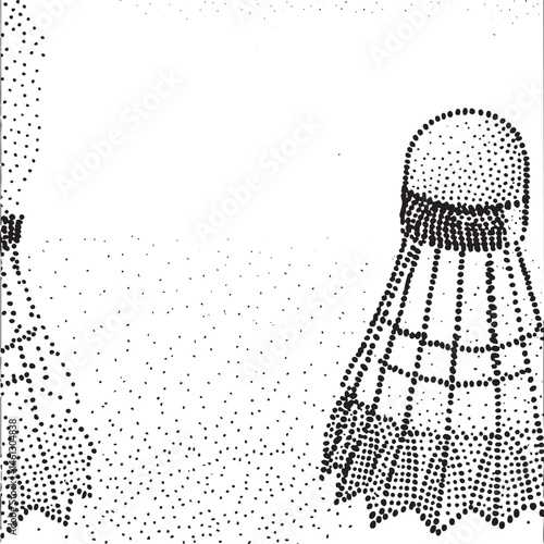 A black shuttlecock rests on a textured surface.