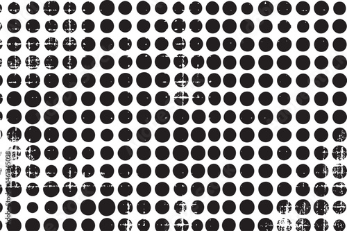 A vast array of black and white circles forms a dynamic abstract