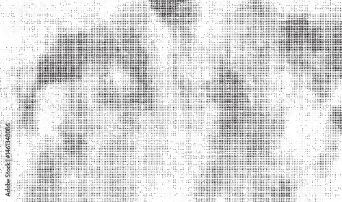 Three playful wolves huddle together in a snowy forest clearing.