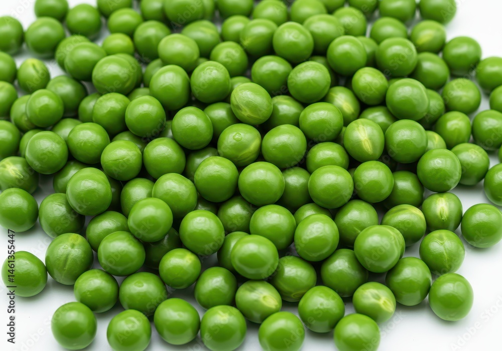Pile of fresh green peas on a white surface, close up Pile of fresh green peas on a white surface, close up