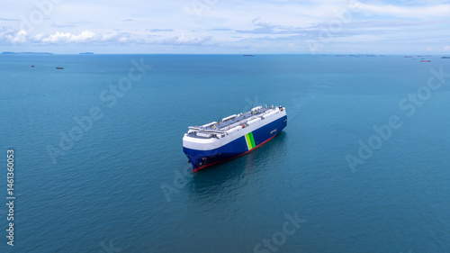 Aerial view RoRo Ship business logistic and transportation sea freight, Cargo and RoRo ship Roll On Roll Off ship at sea, Car carrier ship RO-RO Roll on Roll off.