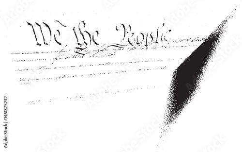 A close-up view of a document revealing the words 'We the People'.