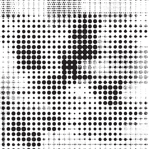 A dense of black and white dots forms a complex abstract