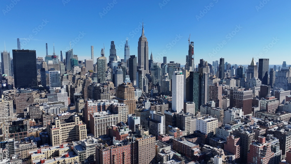 Obraz premium New York Skyline At Manhattan In New York United States. Highrise Buildings Scenery. Beautiful Cityscape. New York Skyline At New York United States. Empire State Building Landscape.
