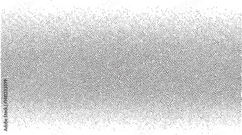 A dense of small white dots covers a dark background.