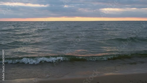 Wallpaper Mural Sea view at sunset with smooth waves and cloudy sky. Tranquil nature background. Torontodigital.ca