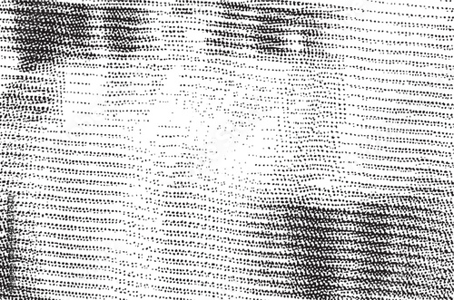A textured black and white abstract surface displays a flowing undulating