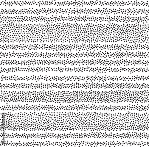 Dense black dots create a textured repeating across the