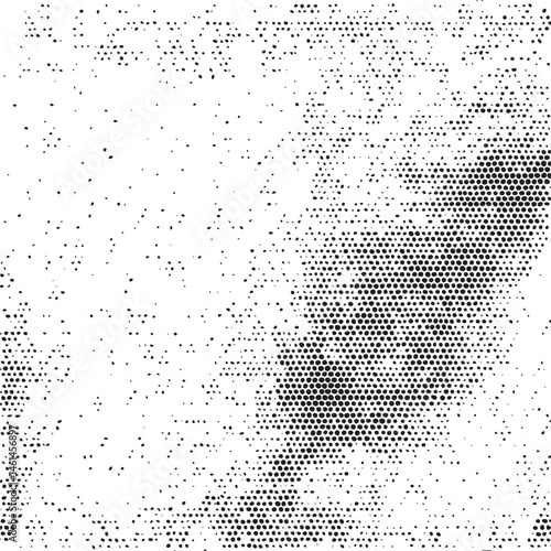 A blurred textured abstract featuring a dark central point against a scattered white background.