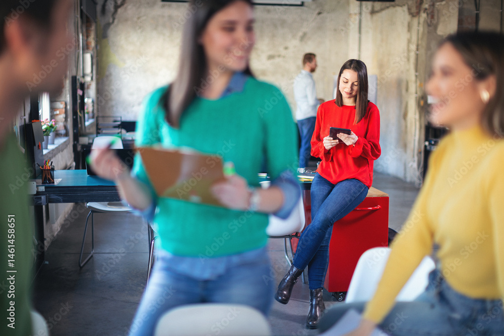 Obraz premium Young software developers in coworking open space