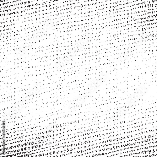 A grayscale gradient transitions from dark to light creating a textured of dots.