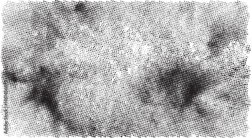 A young woman gazes intently at a textured surface.