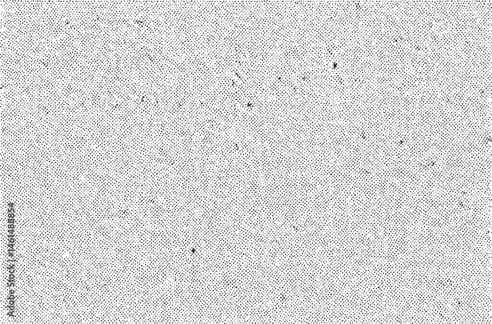 Fototapeta premium A textured gray surface displays a dense of small dots.